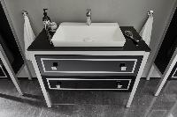 Puris Urfan Loft 128 см:  тумба, черная стеклянная столешница, ножки матовый хром и белая накладная раковина из мин литья, цвет мебели черное стекло